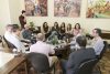Pessoas envolvidas com o acordo em reunião